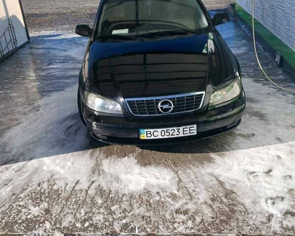 Черный Опель Омега, объемом двигателя 2.5 л и пробегом 215 тыс. км за 3000 $, фото 2 на Automoto.ua
