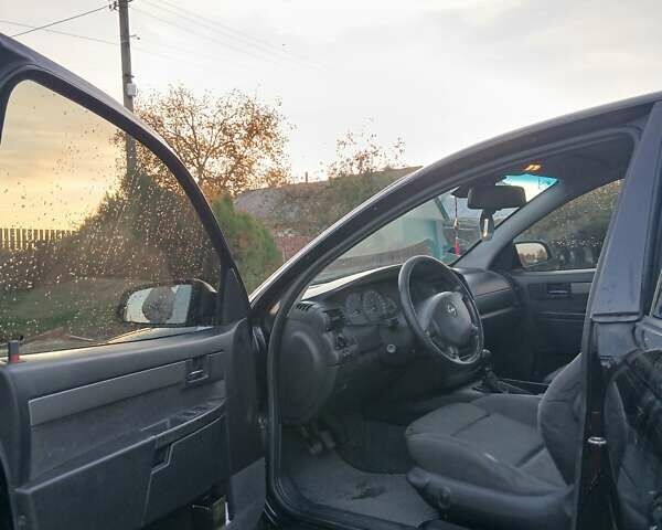 Опель Омега 2003 в Черкассах на Automoto.ua Черный Опель Омега, объемом двигателя 2.17 л и пробегом 273 тыс. км за 4200 $, фото 6 на Automoto.ua