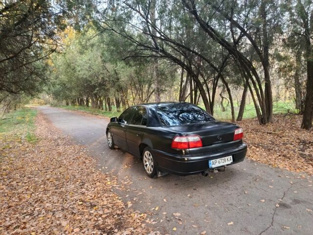 Черный Опель Омега, объемом двигателя 2.6 л и пробегом 350 тыс. км за 3700 $, фото 10 на Automoto.ua