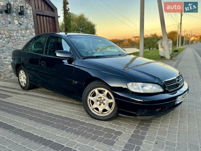 Чорний Опель Омега, об'ємом двигуна 2.2 л та пробігом 312 тис. км за 2999 $, фото 43 на Automoto.ua