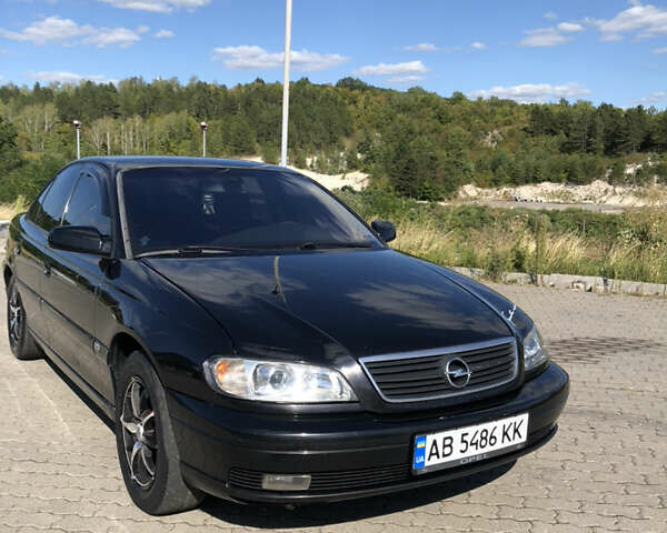 Чорний Опель Омега, об'ємом двигуна 2.2 л та пробігом 467 тис. км за 4000 $, фото 26 на Automoto.ua