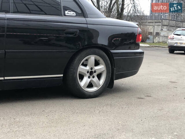 Чорний Опель Омега, об'ємом двигуна 2.2 л та пробігом 335 тис. км за 4000 $, фото 22 на Automoto.ua
