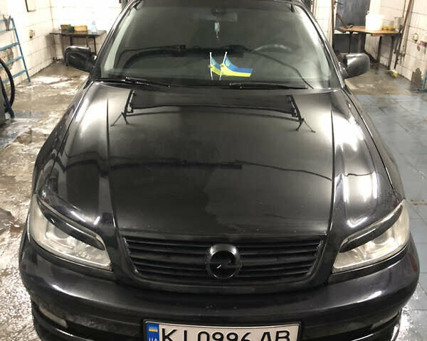 Чорний Опель Омега, об'ємом двигуна 2.2 л та пробігом 335 тис. км за 4000 $, фото 27 на Automoto.ua