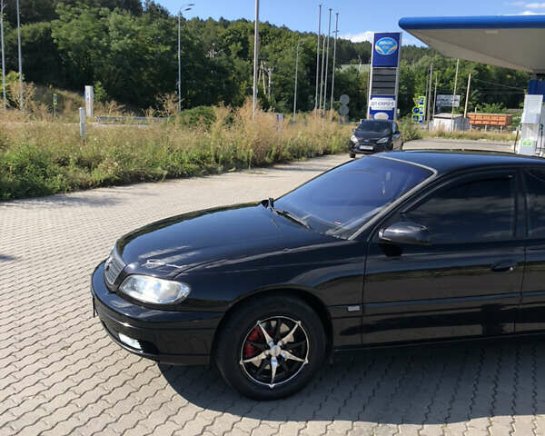 Чорний Опель Омега, об'ємом двигуна 2.2 л та пробігом 467 тис. км за 4000 $, фото 23 на Automoto.ua