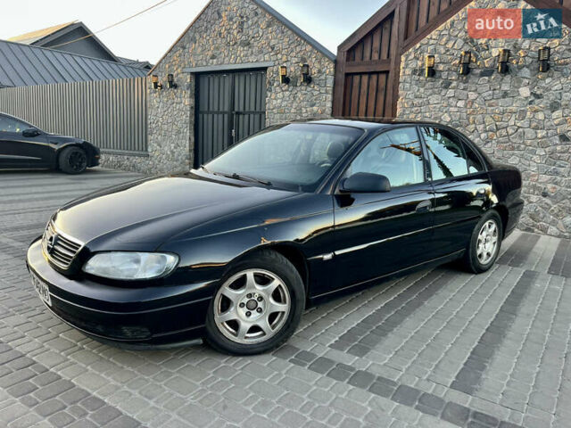 Чорний Опель Омега, об'ємом двигуна 2.2 л та пробігом 312 тис. км за 2999 $, фото 14 на Automoto.ua