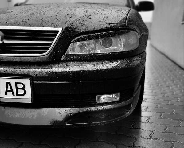 Черный Опель Омега, объемом двигателя 2.2 л и пробегом 335 тыс. км за 4100 $, фото 38 на Automoto.ua