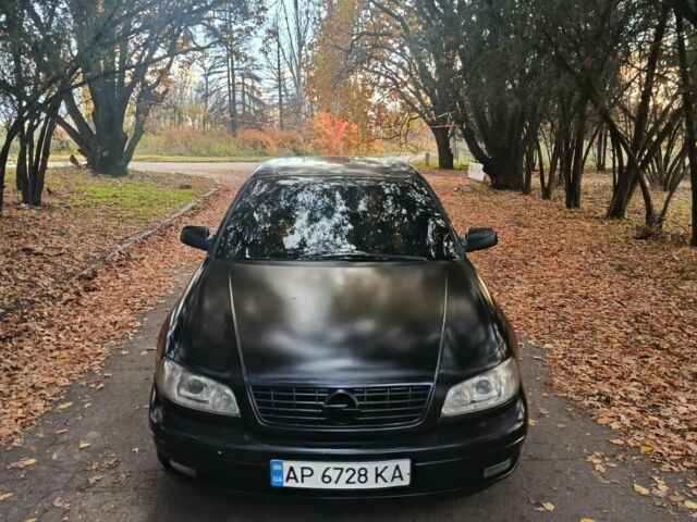 Черный Опель Омега, объемом двигателя 2.6 л и пробегом 350 тыс. км за 3700 $, фото 5 на Automoto.ua