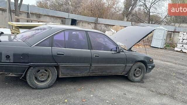 Чорний Опель Омега, об'ємом двигуна 2 л та пробігом 300 тис. км за 800 $, фото 5 на Automoto.ua