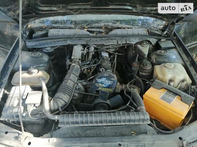 Черный Опель Омега, объемом двигателя 2 л и пробегом 251 тыс. км за 1300 $, фото 9 на Automoto.ua