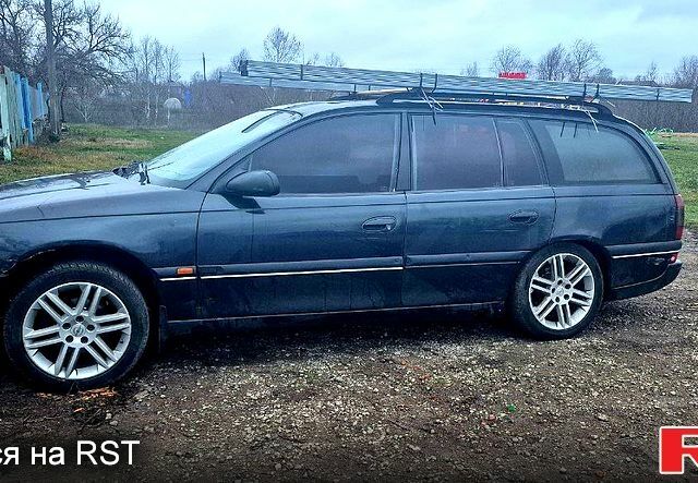 Черный Опель Омега, объемом двигателя 2 л и пробегом 200 тыс. км за 2250 $, фото 1 на Automoto.ua