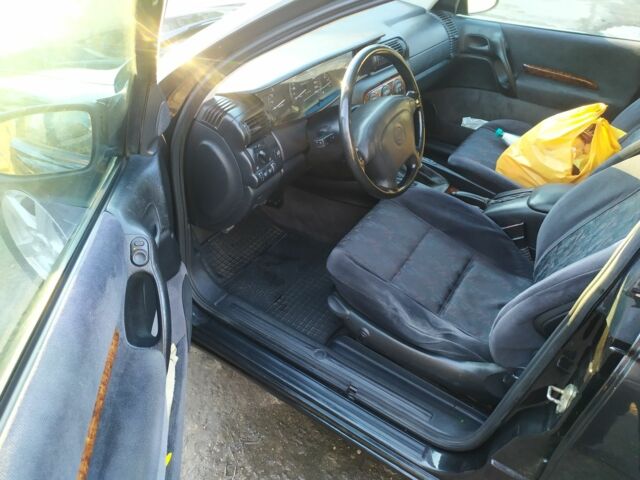 Черный Опель Омега, объемом двигателя 2 л и пробегом 50 тыс. км за 3500 $, фото 8 на Automoto.ua