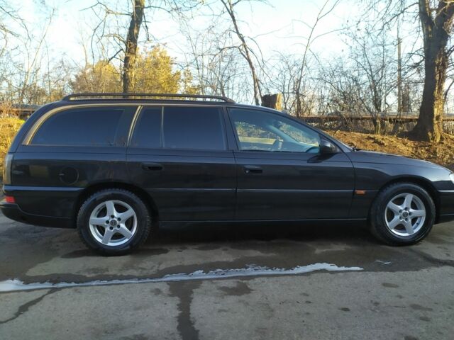 Черный Опель Омега, объемом двигателя 2 л и пробегом 50 тыс. км за 3500 $, фото 11 на Automoto.ua