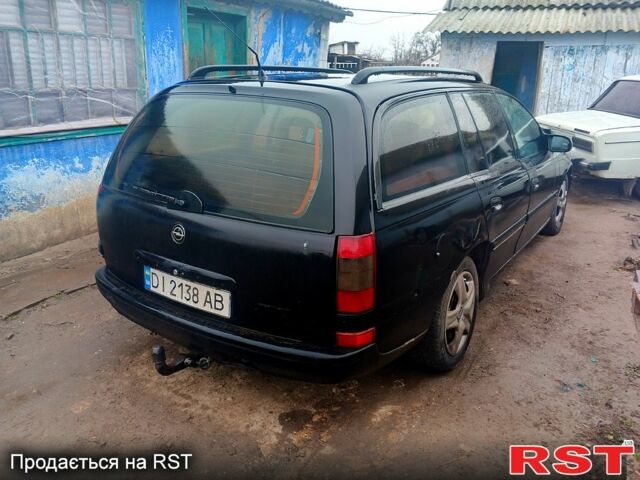Черный Опель Омега, объемом двигателя 2.5 л и пробегом 181 тыс. км за 1200 $, фото 2 на Automoto.ua