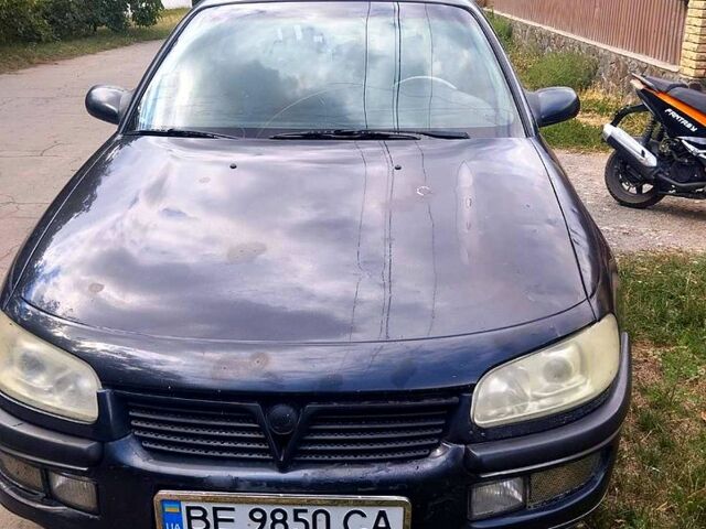 Черный Опель Омега, объемом двигателя 2.5 л и пробегом 320 тыс. км за 1500 $, фото 1 на Automoto.ua