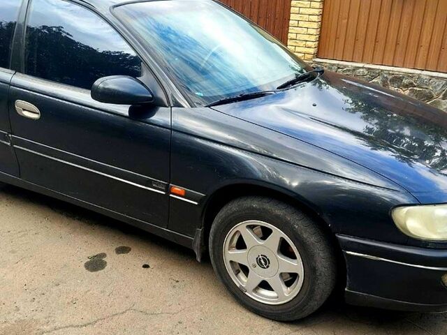 Черный Опель Омега, объемом двигателя 2.5 л и пробегом 320 тыс. км за 1500 $, фото 6 на Automoto.ua