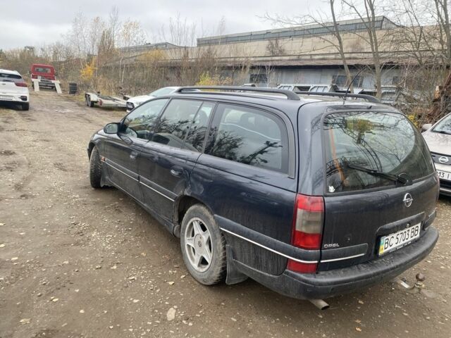 Чорний Опель Омега, об'ємом двигуна 2.5 л та пробігом 200 тис. км за 1300 $, фото 1 на Automoto.ua