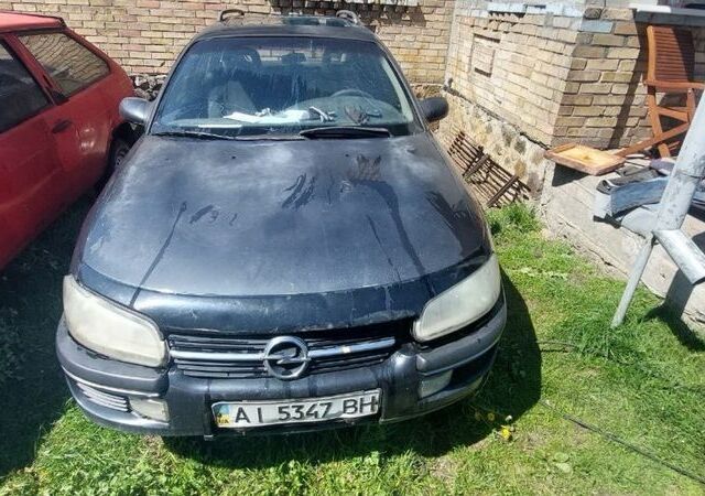 Чорний Опель Омега, об'ємом двигуна 2.5 л та пробігом 1000 тис. км за 750 $, фото 1 на Automoto.ua