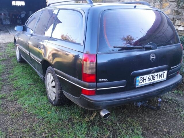 Черный Опель Омега, объемом двигателя 2 л и пробегом 198 тыс. км за 2700 $, фото 2 на Automoto.ua