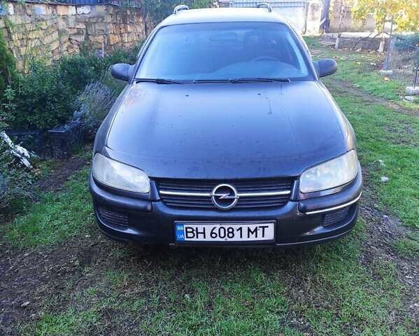 Черный Опель Омега, объемом двигателя 2 л и пробегом 195 тыс. км за 2700 $, фото 6 на Automoto.ua