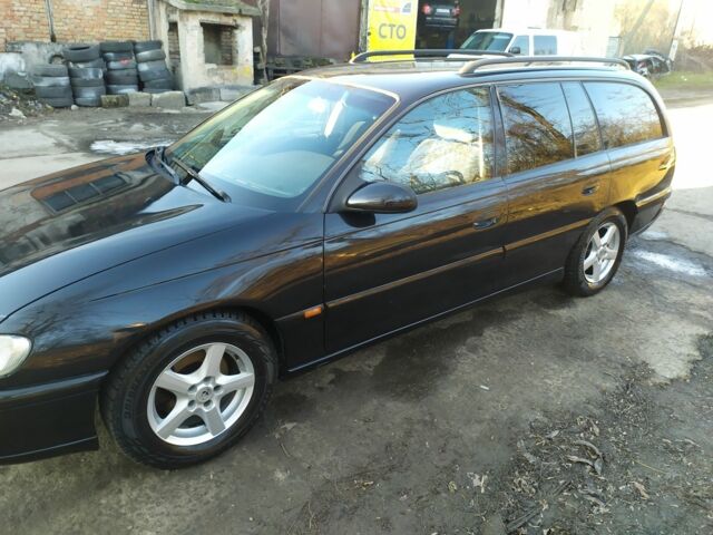 Черный Опель Омега, объемом двигателя 2 л и пробегом 50 тыс. км за 3500 $, фото 5 на Automoto.ua