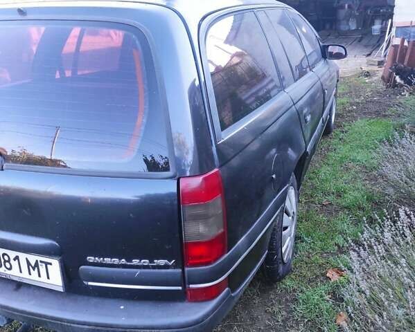 Черный Опель Омега, объемом двигателя 2 л и пробегом 195 тыс. км за 2700 $, фото 7 на Automoto.ua