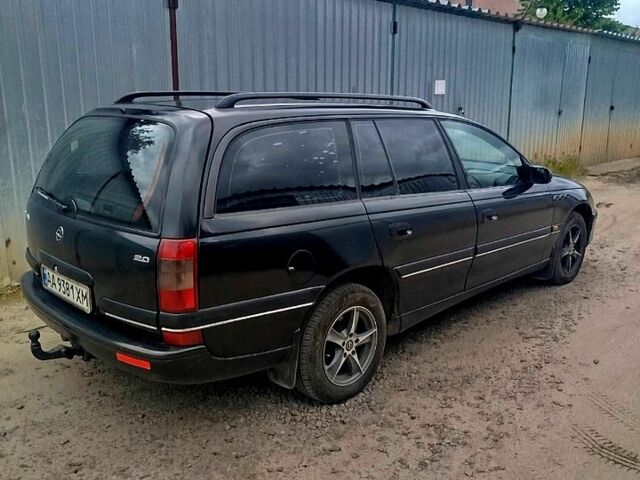 Чорний Опель Омега, об'ємом двигуна 2 л та пробігом 303 тис. км за 2500 $, фото 3 на Automoto.ua