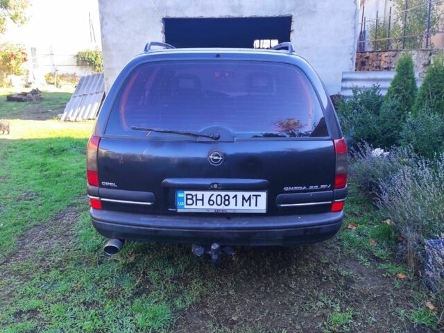 Черный Опель Омега, объемом двигателя 2 л и пробегом 198 тыс. км за 2700 $, фото 5 на Automoto.ua