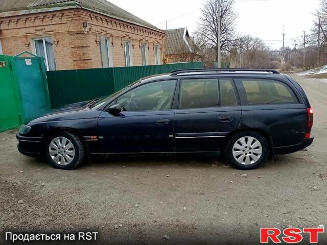 Чорний Опель Омега, об'ємом двигуна 2.5 л та пробігом 422 тис. км за 1950 $, фото 10 на Automoto.ua