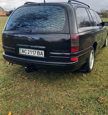 Опель Омега 1997 в Луцке на Automoto.ua Черный Опель Омега, объемом двигателя 2.5 л и пробегом 445 тыс. км за 1750 $, фото 4 на Automoto.ua