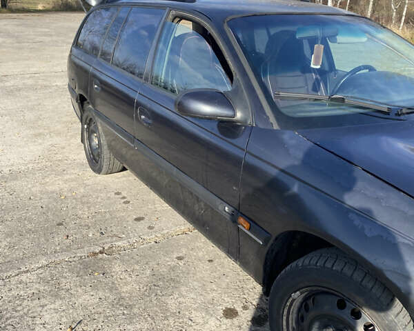 Черный Опель Омега, объемом двигателя 2 л и пробегом 289 тыс. км за 1300 $, фото 6 на Automoto.ua