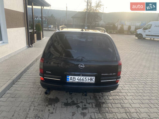 Черный Опель Омега, объемом двигателя 2 л и пробегом 283 тыс. км за 2200 $, фото 3 на Automoto.ua