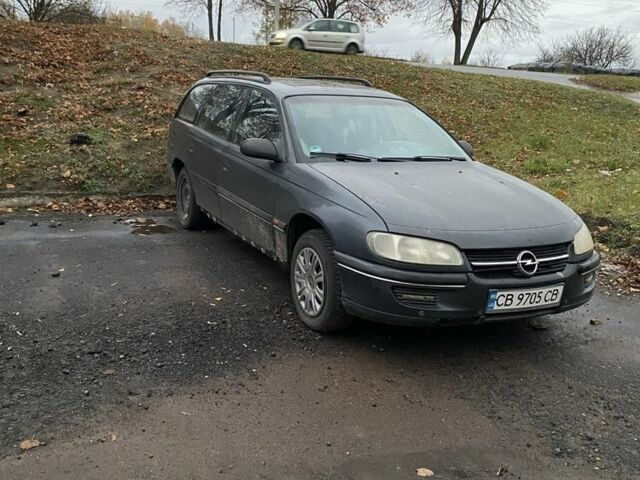 Черный Опель Омега, объемом двигателя 2 л и пробегом 320 тыс. км за 1200 $, фото 1 на Automoto.ua