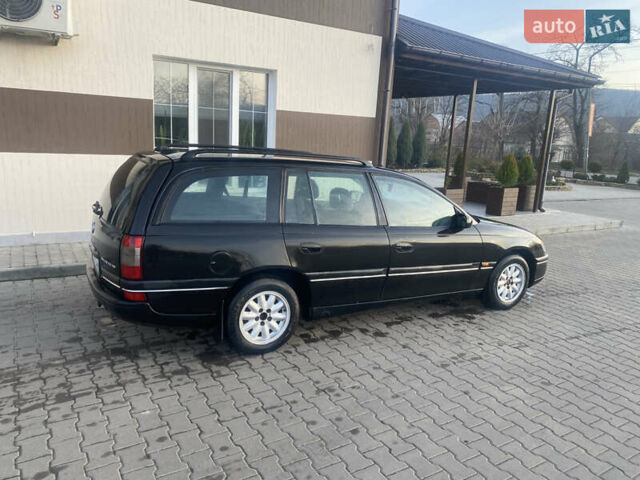 Черный Опель Омега, объемом двигателя 2 л и пробегом 283 тыс. км за 2200 $, фото 4 на Automoto.ua