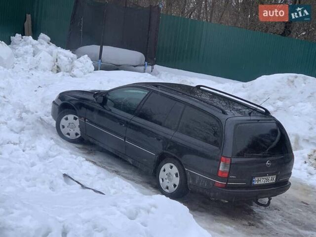 Чорний Опель Омега, об'ємом двигуна 2 л та пробігом 387 тис. км за 1900 $, фото 1 на Automoto.ua