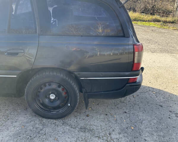 Черный Опель Омега, объемом двигателя 2 л и пробегом 289 тыс. км за 1300 $, фото 9 на Automoto.ua