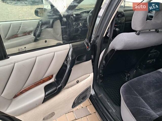 Чорний Опель Омега, об'ємом двигуна 2 л та пробігом 280 тис. км за 2500 $, фото 43 на Automoto.ua