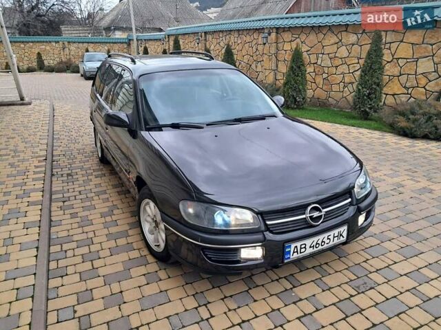 Чорний Опель Омега, об'ємом двигуна 2 л та пробігом 280 тис. км за 2500 $, фото 63 на Automoto.ua