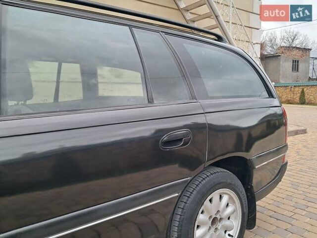 Чорний Опель Омега, об'ємом двигуна 2 л та пробігом 280 тис. км за 2500 $, фото 36 на Automoto.ua