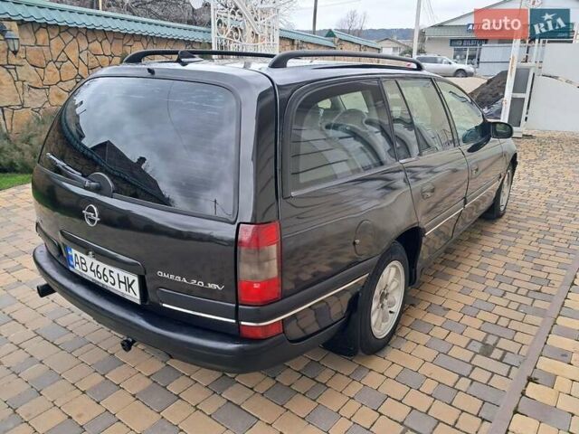 Чорний Опель Омега, об'ємом двигуна 2 л та пробігом 280 тис. км за 2500 $, фото 56 на Automoto.ua