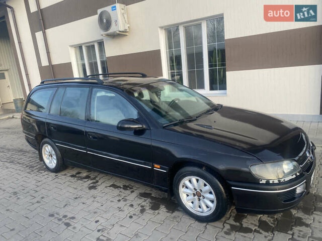 Черный Опель Омега, объемом двигателя 2 л и пробегом 283 тыс. км за 2200 $, фото 2 на Automoto.ua