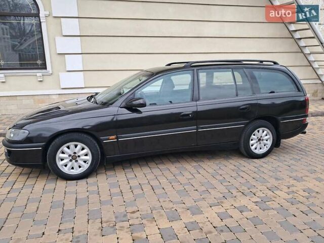 Чорний Опель Омега, об'ємом двигуна 2 л та пробігом 280 тис. км за 2500 $, фото 14 на Automoto.ua