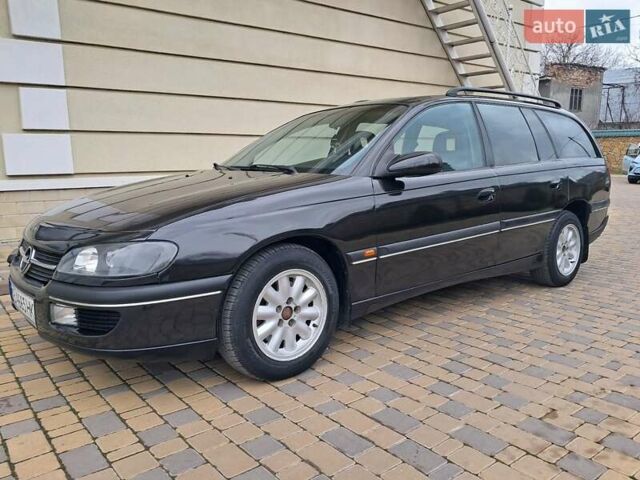 Чорний Опель Омега, об'ємом двигуна 2 л та пробігом 280 тис. км за 2500 $, фото 12 на Automoto.ua