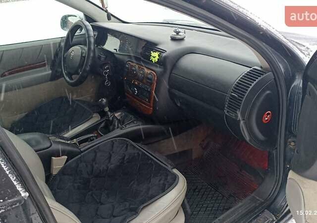 Черный Опель Омега, объемом двигателя 2 л и пробегом 282 тыс. км за 2000 $, фото 17 на Automoto.ua