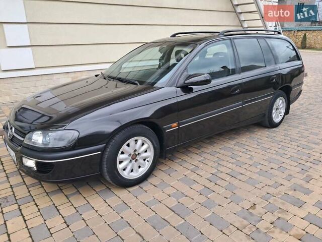 Чорний Опель Омега, об'ємом двигуна 2 л та пробігом 280 тис. км за 2500 $, фото 53 на Automoto.ua