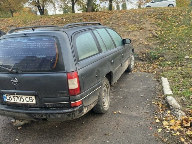Черный Опель Омега, объемом двигателя 2 л и пробегом 320 тыс. км за 1200 $, фото 3 на Automoto.ua