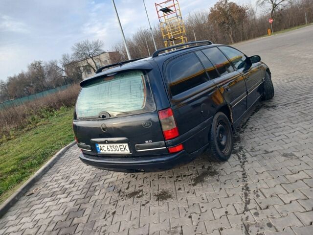 Черный Опель Омега, объемом двигателя 2 л и пробегом 284 тыс. км за 1600 $, фото 8 на Automoto.ua