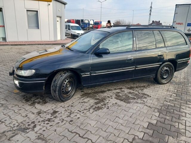 Черный Опель Омега, объемом двигателя 2 л и пробегом 284 тыс. км за 1600 $, фото 14 на Automoto.ua