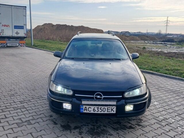 Черный Опель Омега, объемом двигателя 2 л и пробегом 284 тыс. км за 1600 $, фото 12 на Automoto.ua