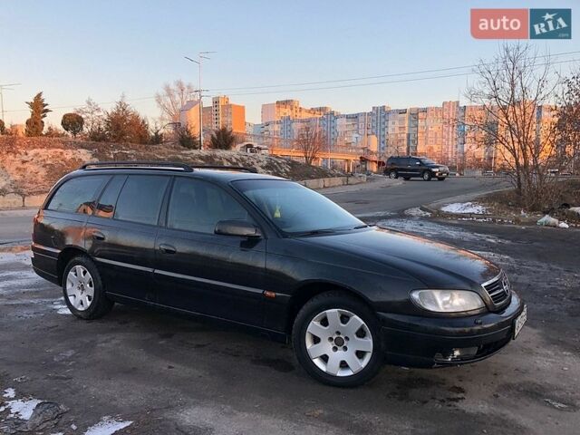 Черный Опель Омега, объемом двигателя 2.2 л и пробегом 350 тыс. км за 3500 $, фото 7 на Automoto.ua