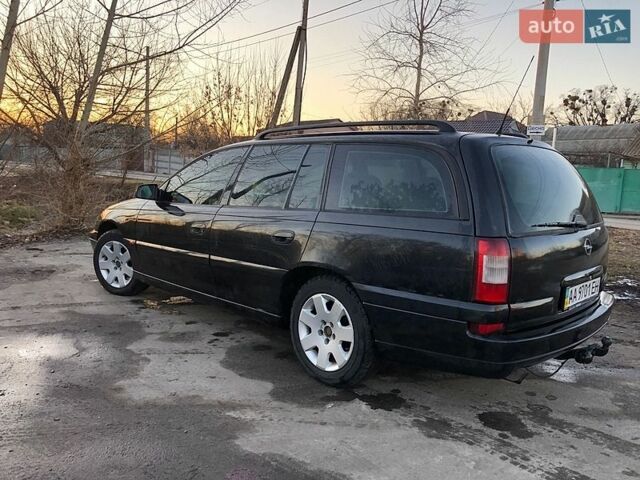 Черный Опель Омега, объемом двигателя 2.2 л и пробегом 350 тыс. км за 3500 $, фото 10 на Automoto.ua